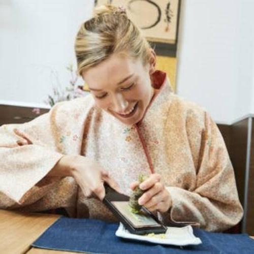 Clarice Okada posing during a Japanese cooking class